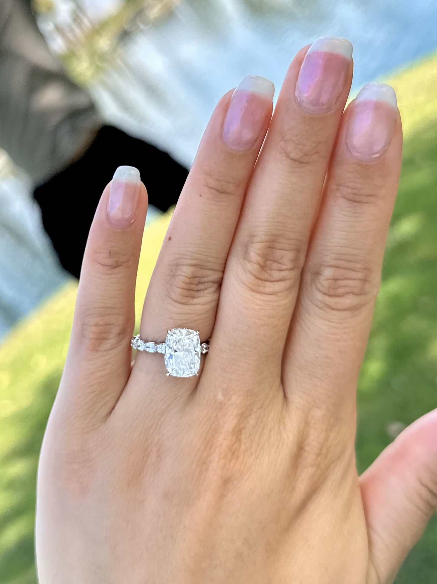 Oval East West Band and Hidden Halo Engagement Ring