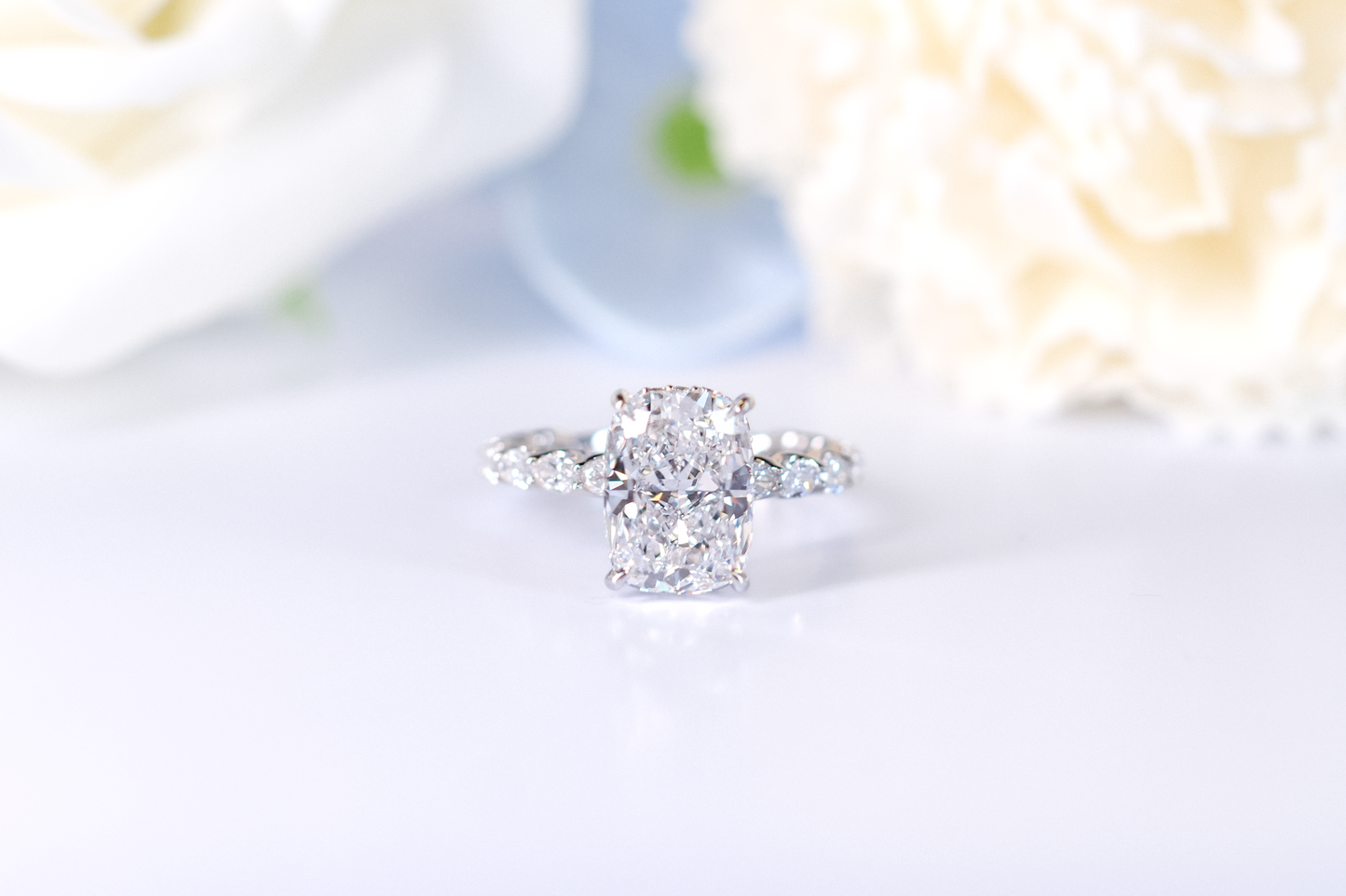 Oval East West Band and Hidden Halo Engagement Ring