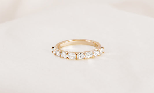 Elara Emerald and Oval East West Alternating Band