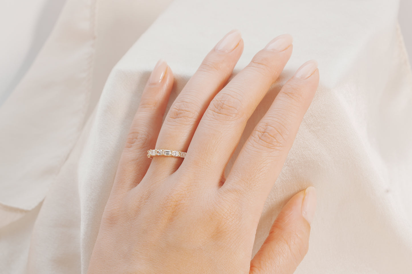 Elara Emerald and Oval East West Alternating Band