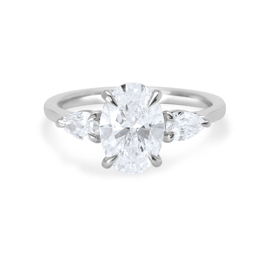 Oval and Pear Diamond Three Stone Diamond Engagement Ring