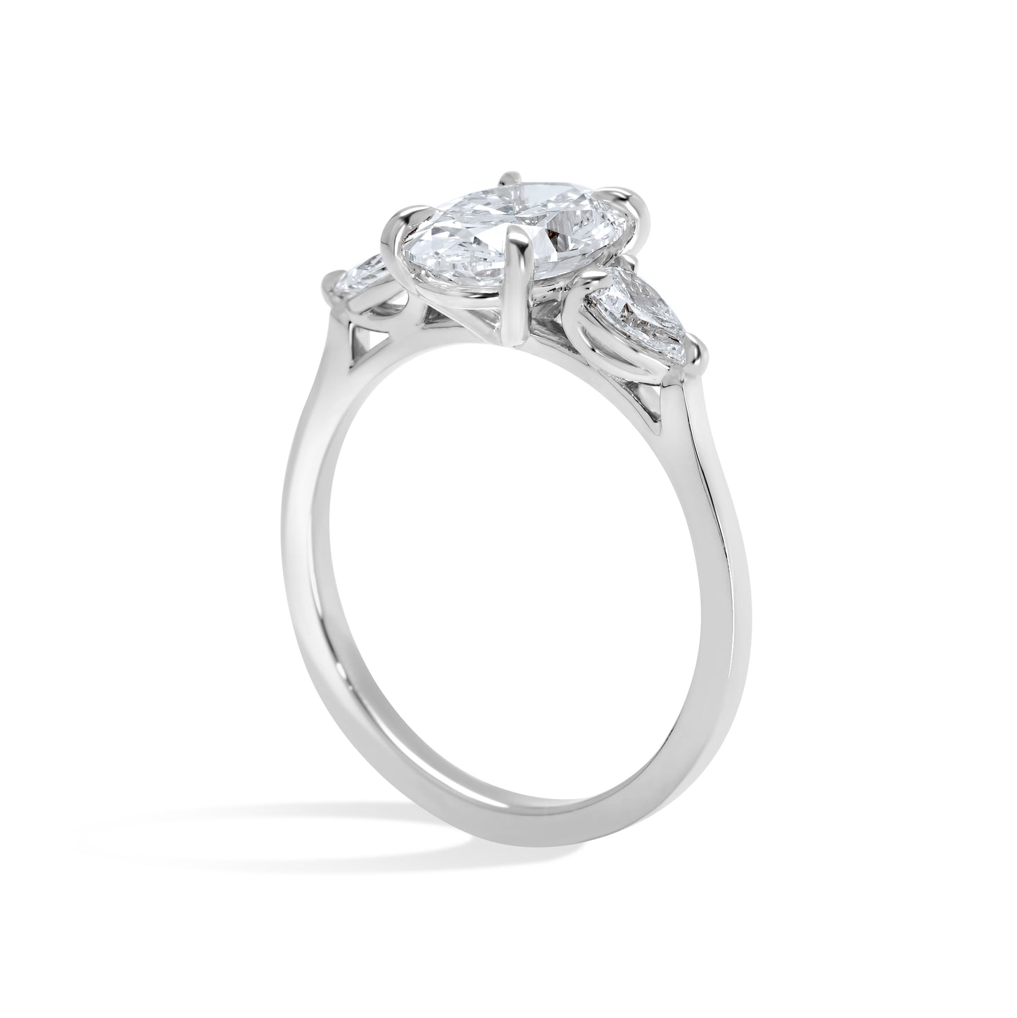 Oval and Pear Diamond Three Stone Diamond Engagement Ring