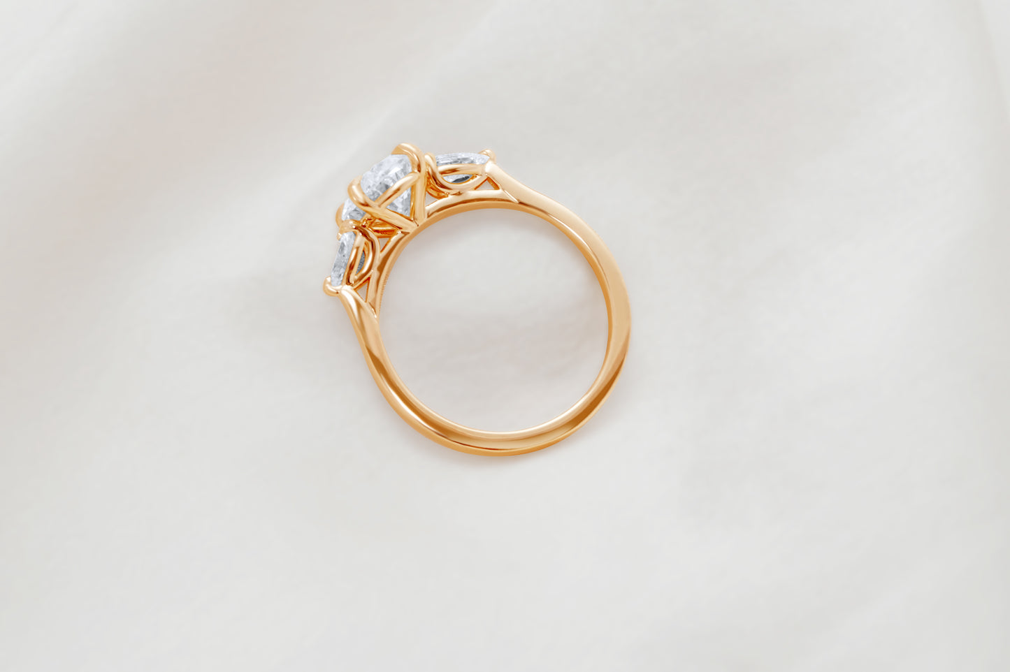 Oval and Pear Diamond Three Stone Diamond Engagement Ring