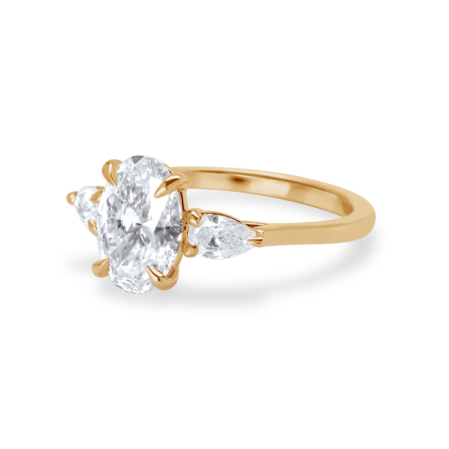 Oval and Pear Diamond Three Stone Diamond Engagement Ring