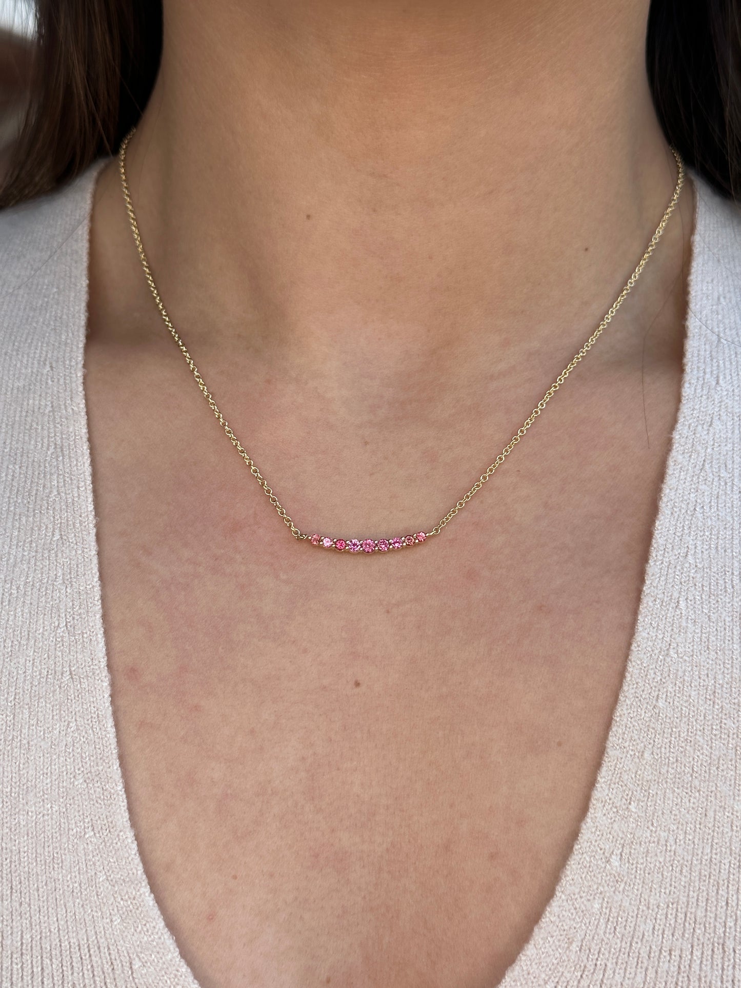 On Model: Pink Spinel Smile Crescent Necklace, Unheated Pink Spinel from Vietnam, 18K Yellow Gold.