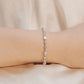 Emerald and Round alternating Line Bracelet