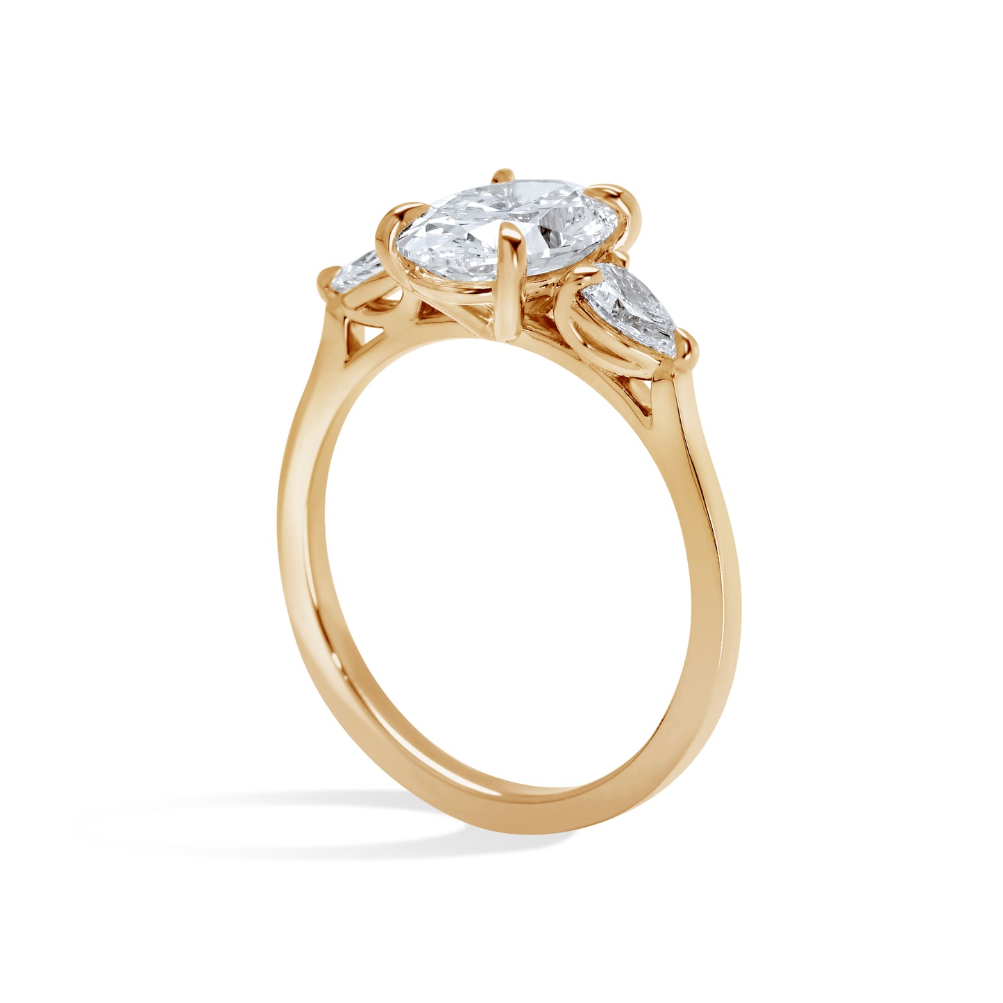 Oval and Pear Diamond Three Stone Diamond Engagement Ring