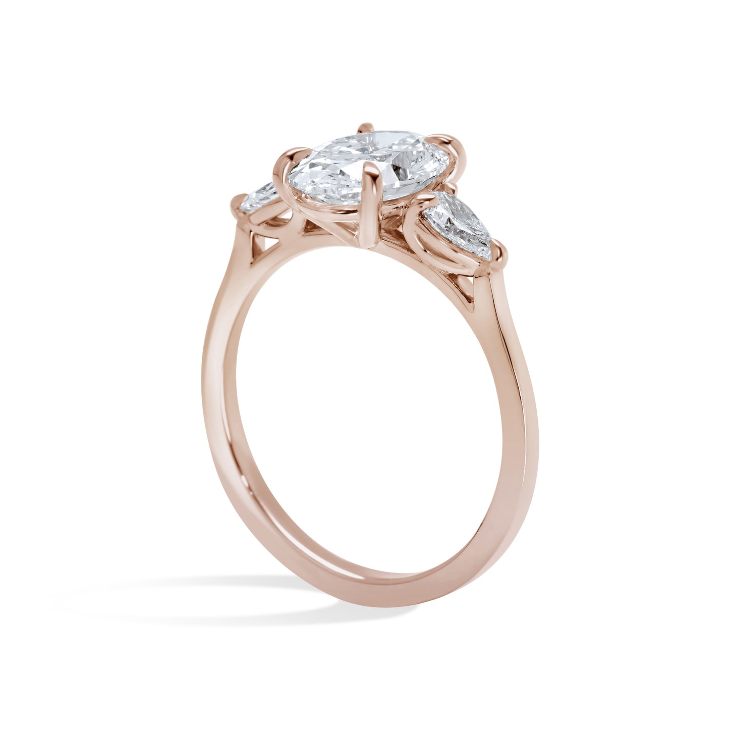 Oval and Pear Diamond Three Stone Diamond Engagement Ring