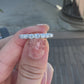 Olena Oval Brilliant Cut Diamond Half Way Band